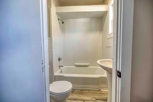 a bathroom with a sink and a toilet