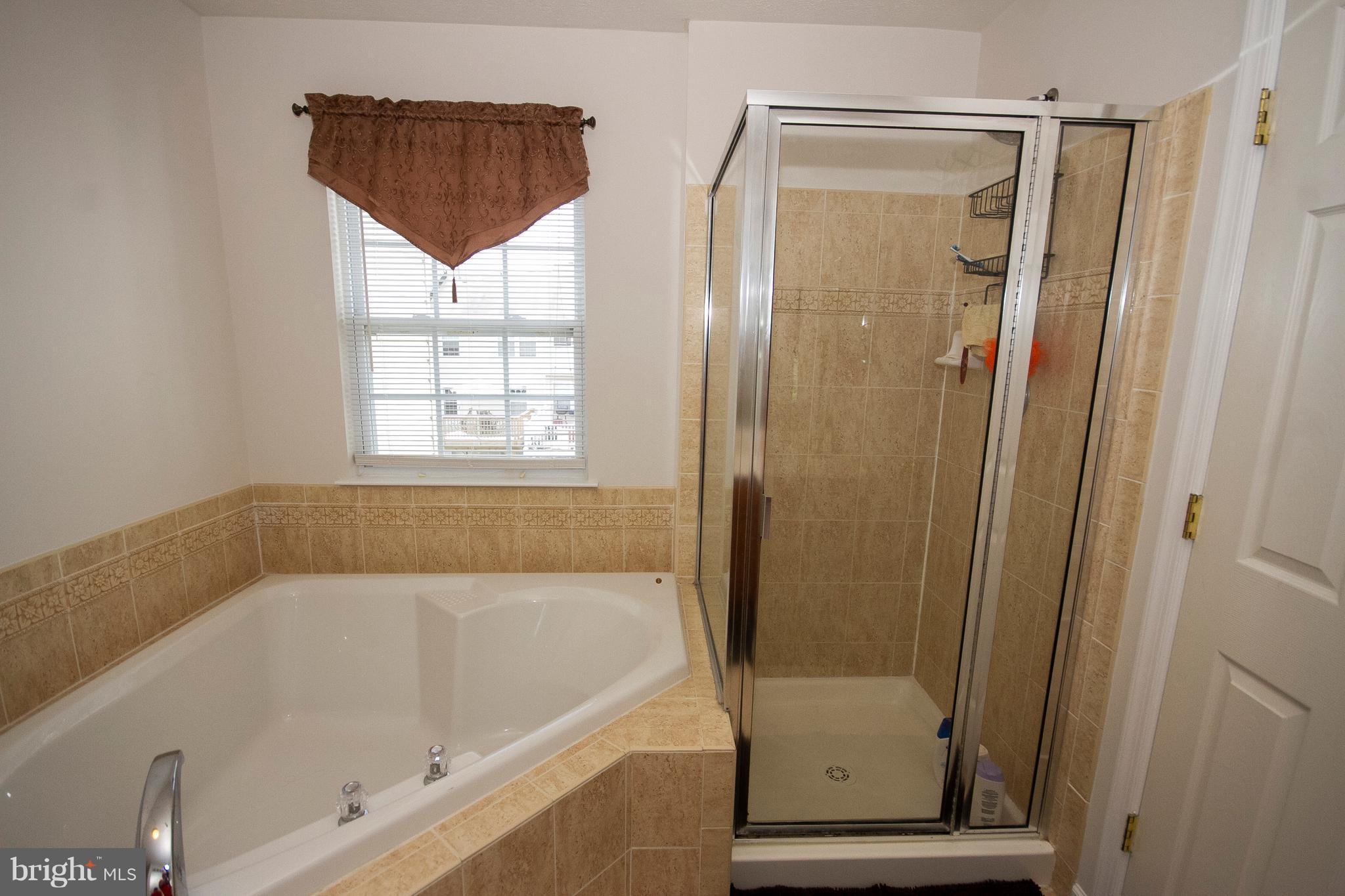 812 Tipton Road Middle River, MD 21220 - Photo 26 of 30 OWNER BATH SEPARATE SOAK TUB AND SHOWER