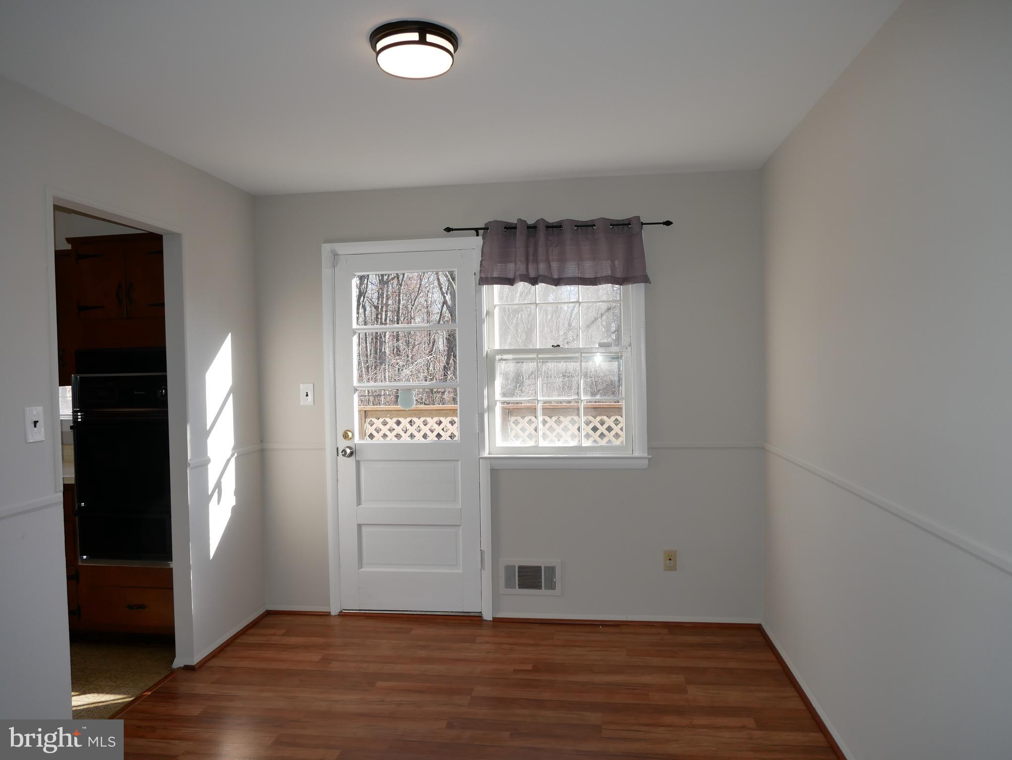 313 Highmeadow Road Reisterstown, MD 21136 - Photo 9 of 31 Dining Room & access to the deck