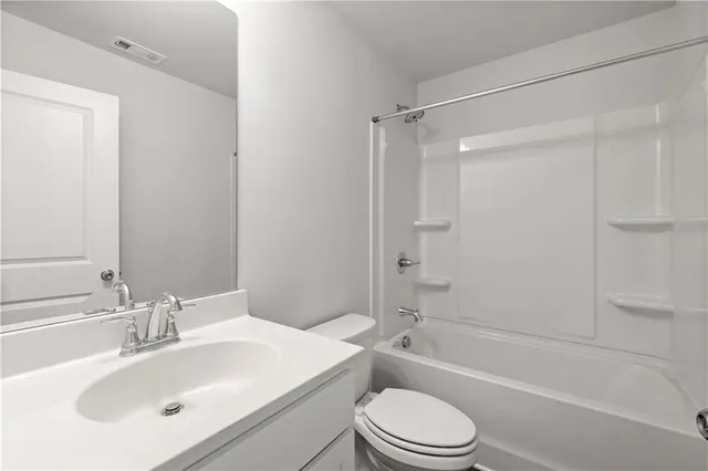 a view of entryway with wooden floor and stairs