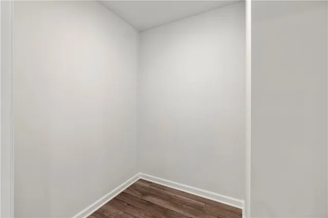 a kitchen with stainless steel appliances granite countertop a sink and a microwave