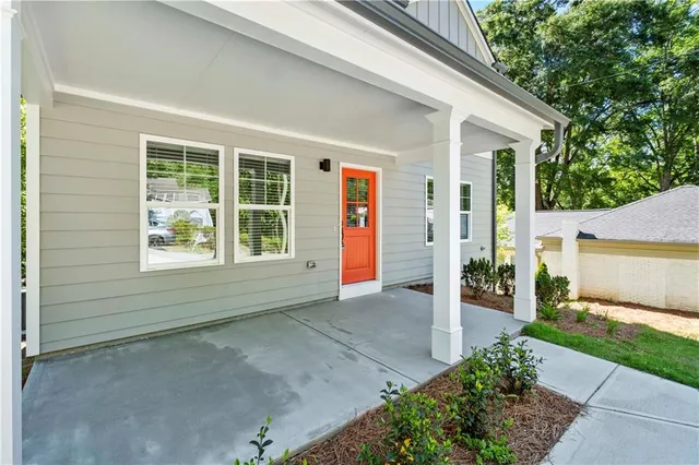 a house with garden in front of it