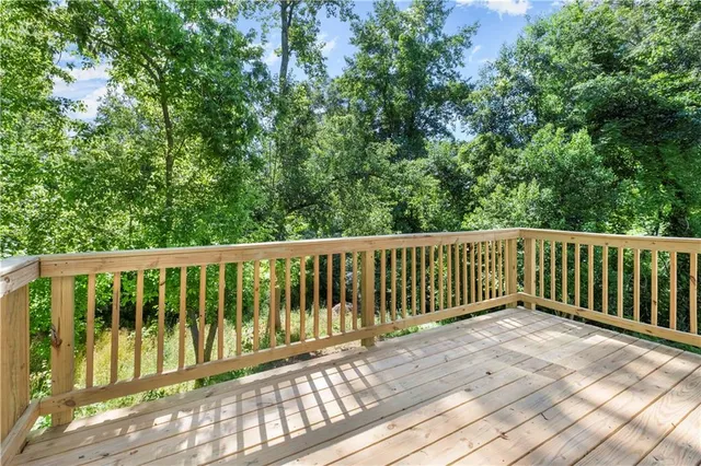 a view of a two chairs in the balcony