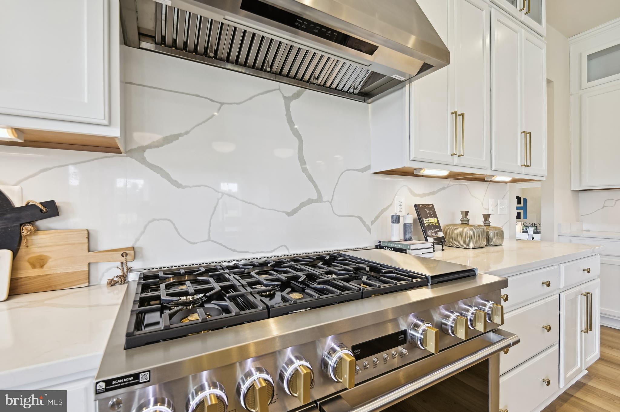 6112 Clarks Lane Baltimore, MD 21209 - Photo 20 of 40 a kitchen with granite countertop a stove and a sink