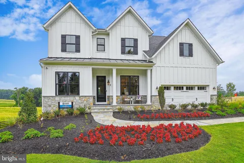 a front view of a house with entertaining space