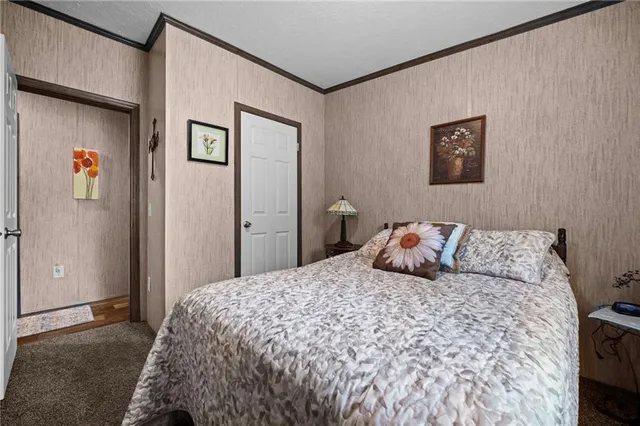 a bedroom with a bed and a cabinets