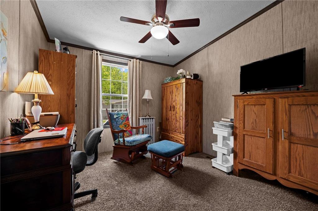 73 South Summit Road, Unit 510 Greenville, PA 16125 - Photo 23 of 33 a living room with furniture and a flat screen tv