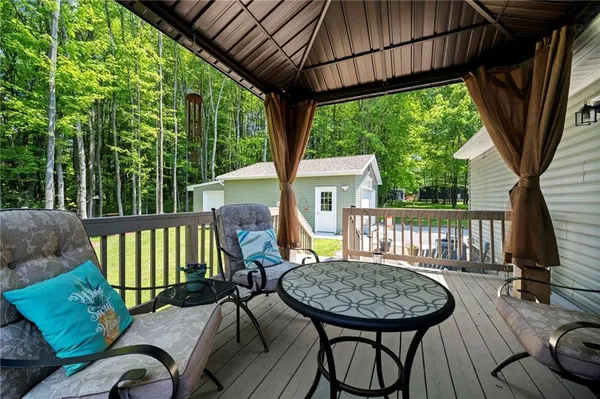 a view of balcony with a patio and wooden floor