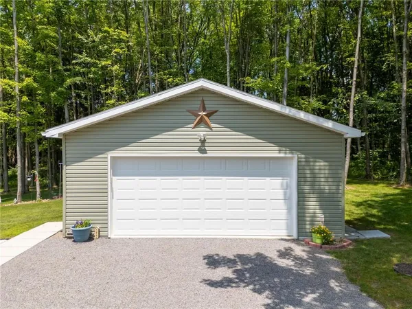 a backyard of a house with lots of green space