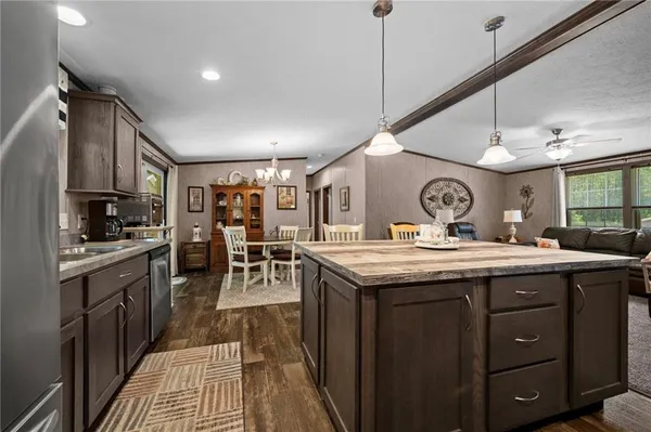 a kitchen with a stove and cabinets