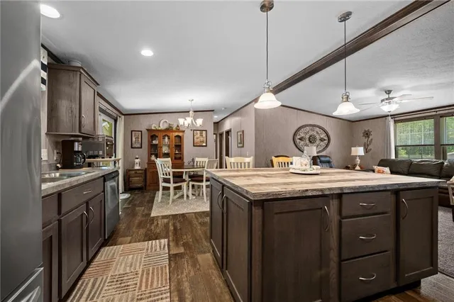 a kitchen with a stove and cabinets