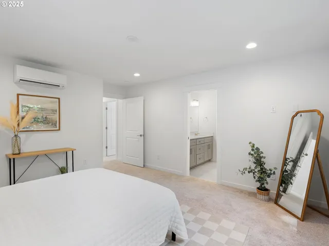 a white toilet sitting next to a bathroom sink