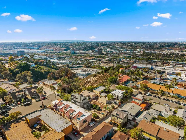 an aerial view of residential building with parking space