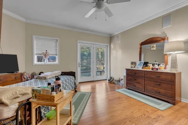 a bed room with furniture and a window