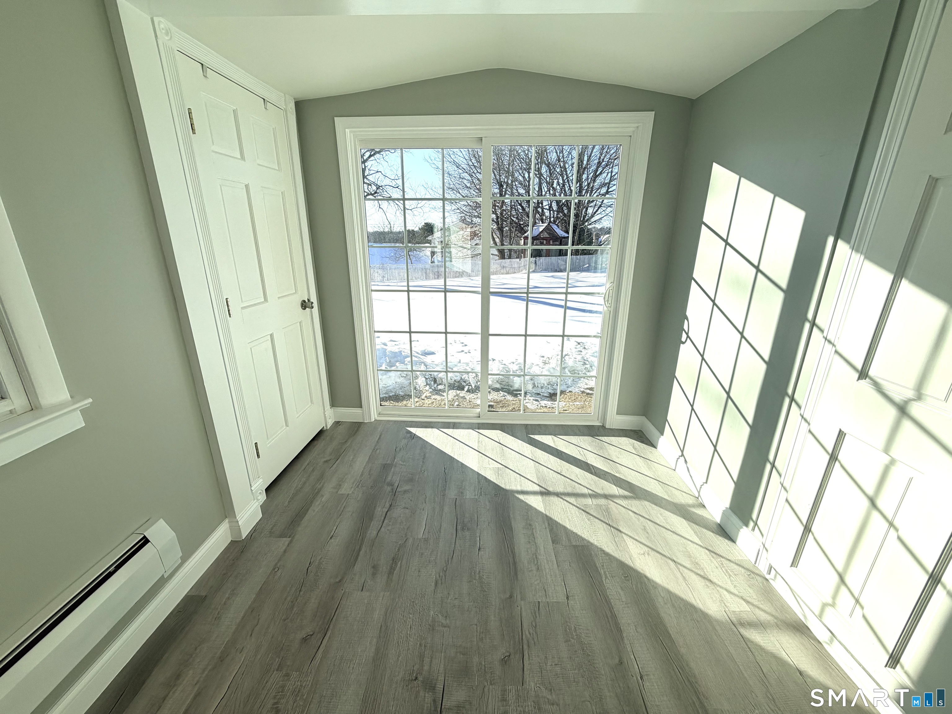 141 Starr Hill Road Groton, CT 06340 - Photo 11 of 31 a view of an empty room with a window