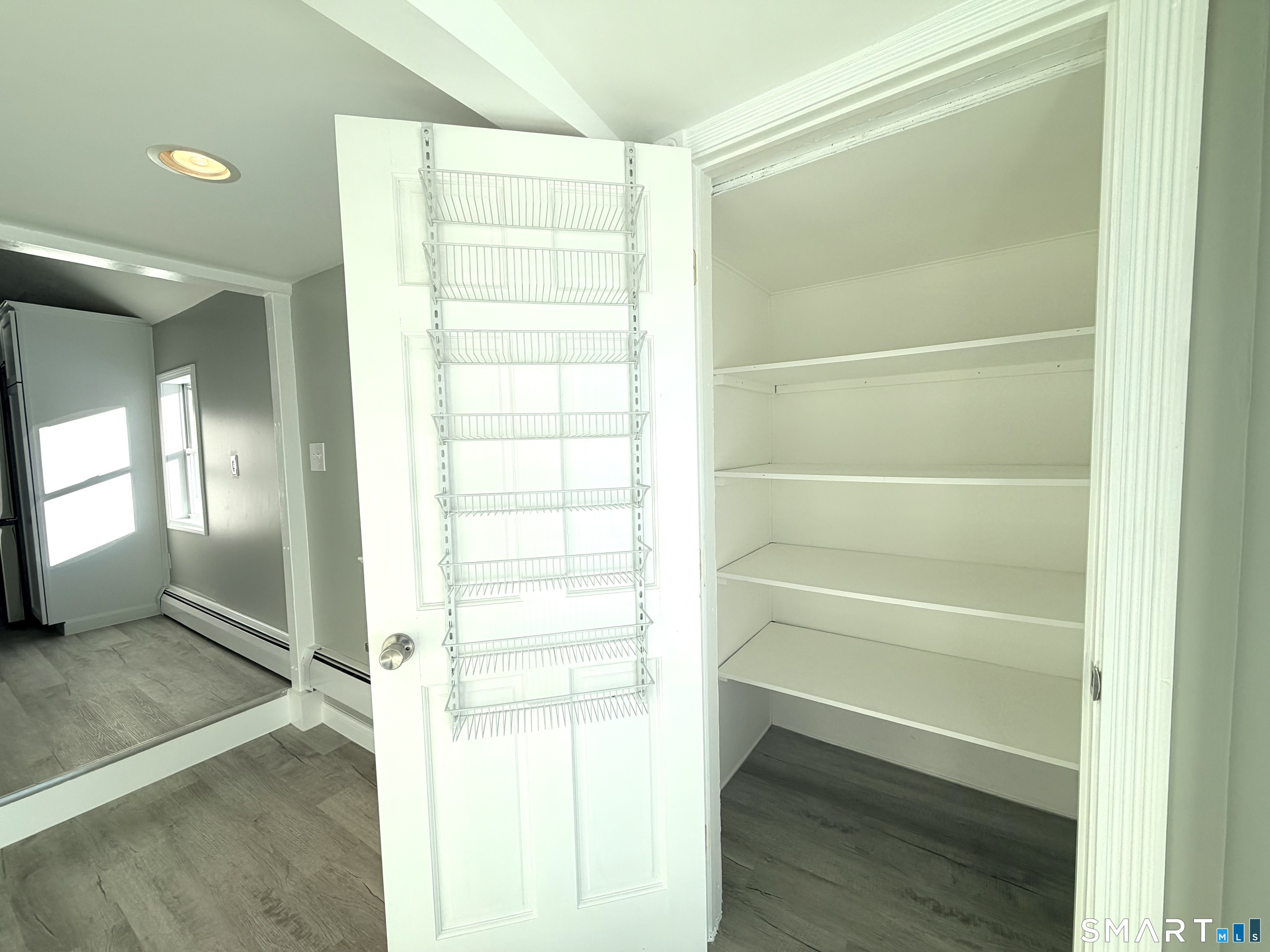 141 Starr Hill Road Groton, CT 06340 - Photo 12 of 31 a view of walk in closet with empty racks