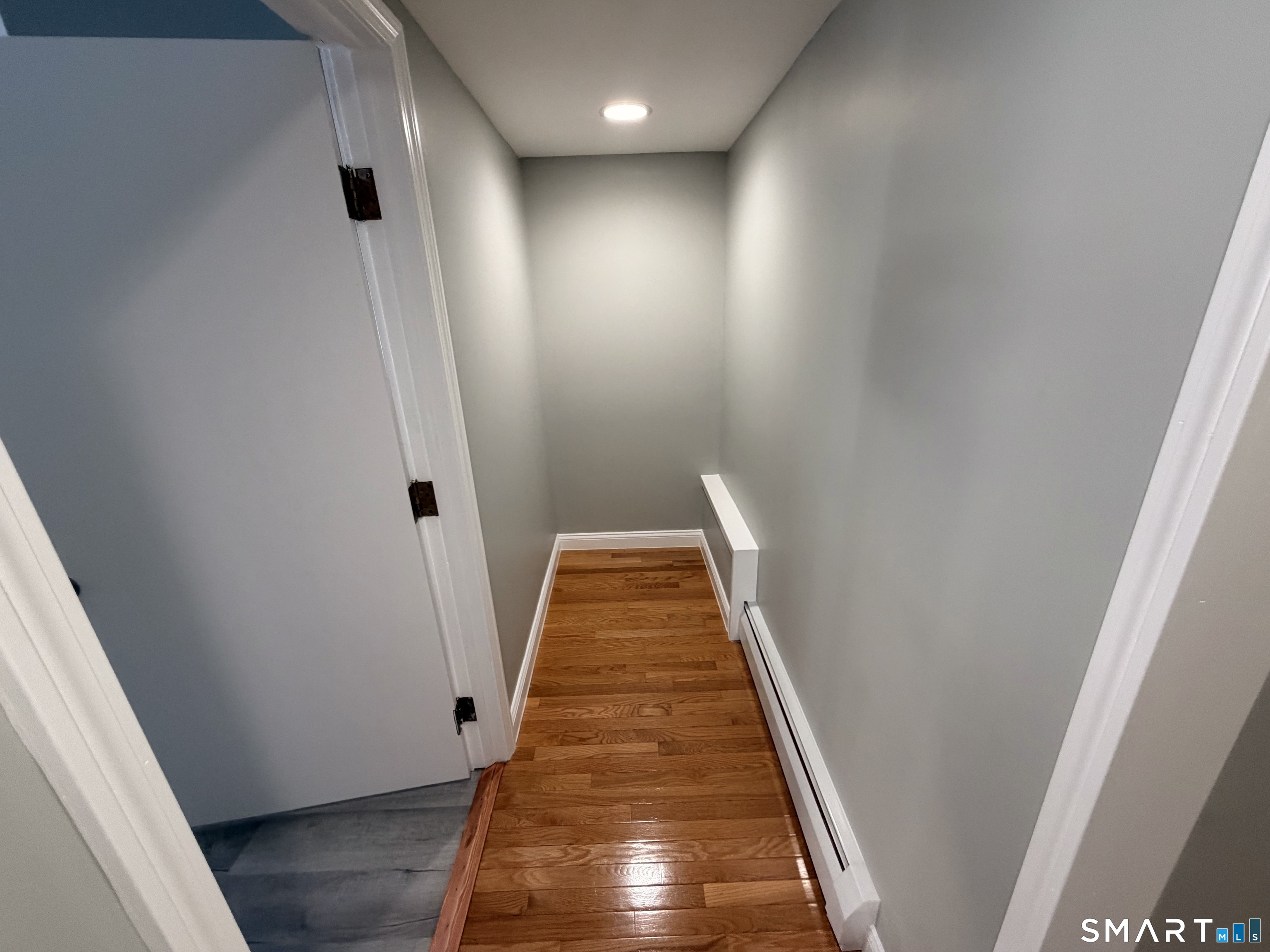 141 Starr Hill Road Groton, CT 06340 - Photo 21 of 31 a view of entryway with wooden floor
