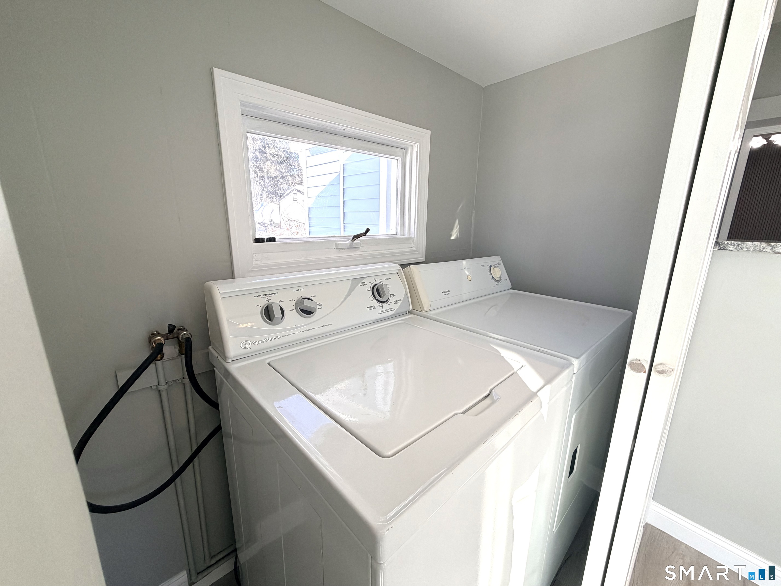 141 Starr Hill Road Groton, CT 06340 - Photo 25 of 31 a utility room with dryer and washer