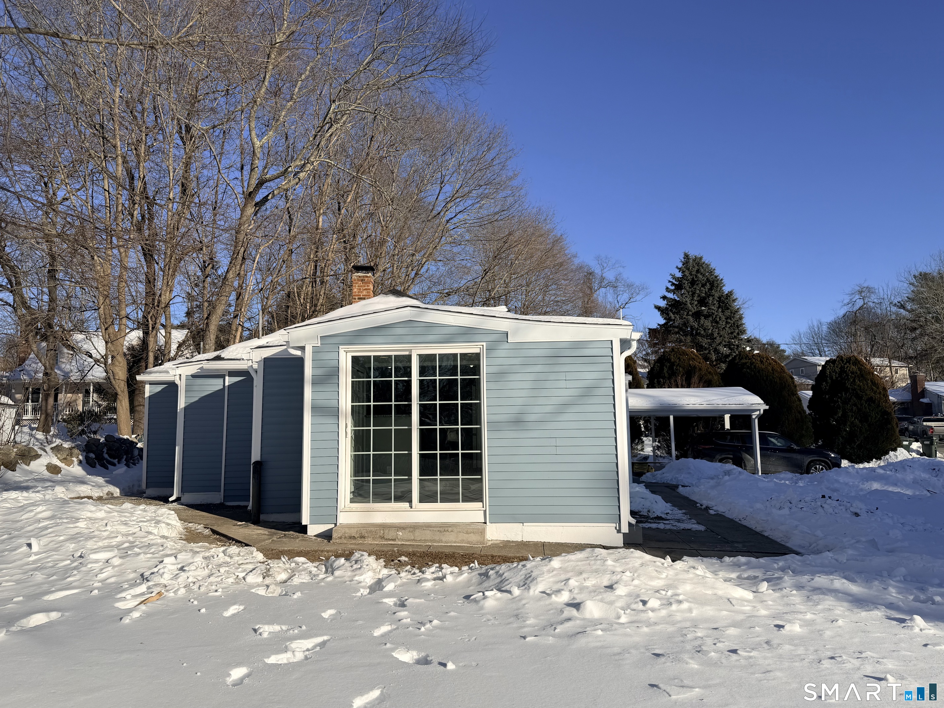 141 Starr Hill Road Groton, CT 06340 - Photo 26 of 31 a front view of a house with a yard and garage