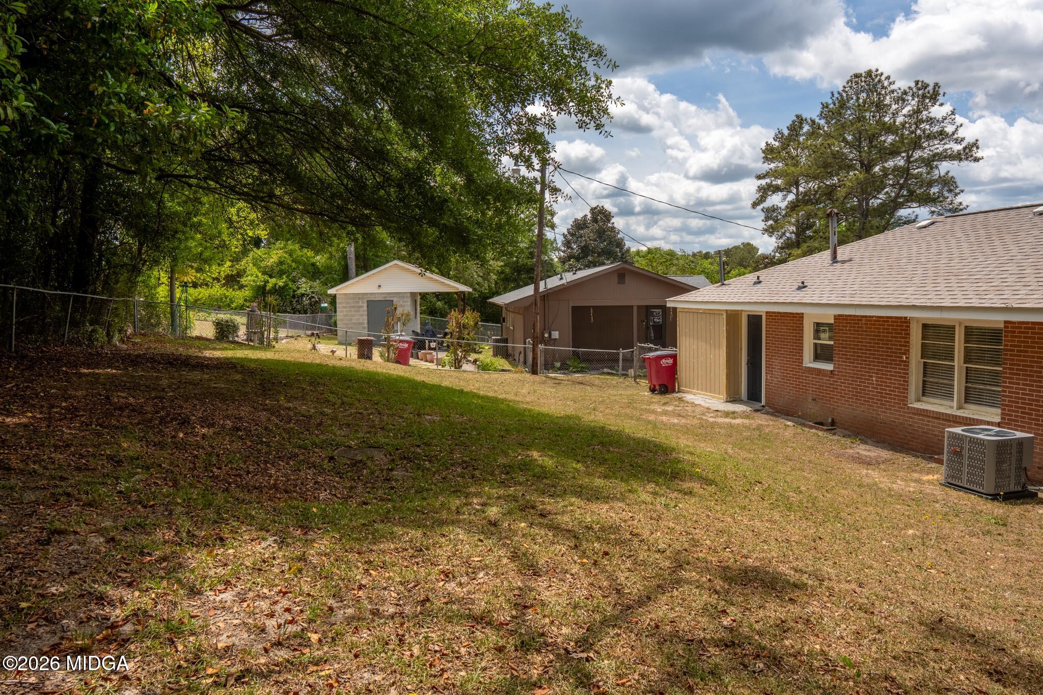 3319 Mohawk Road Macon, GA 31217 - Photo 5 of 38 a front view of a house with garden