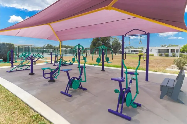 a view of a swimming pool with a patio