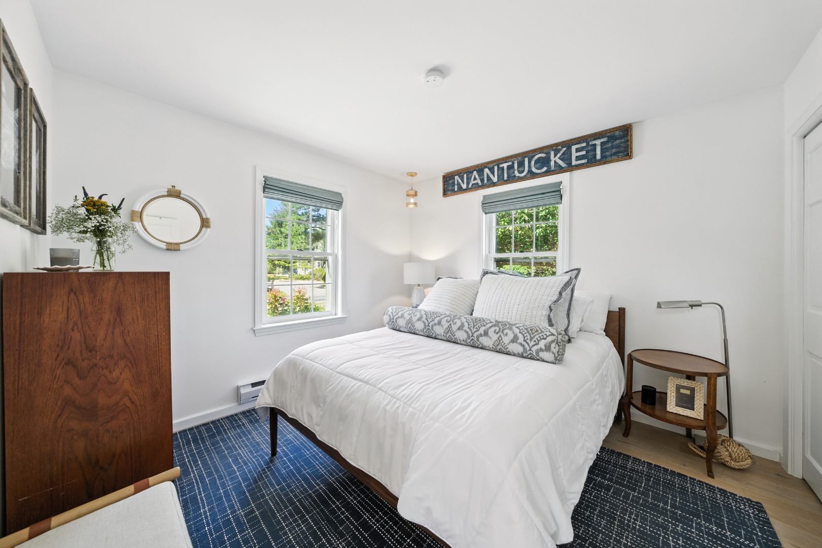2 The Grove Nantucket, MA 02554 - Photo 14 of 33 a bedroom with a bed and a window