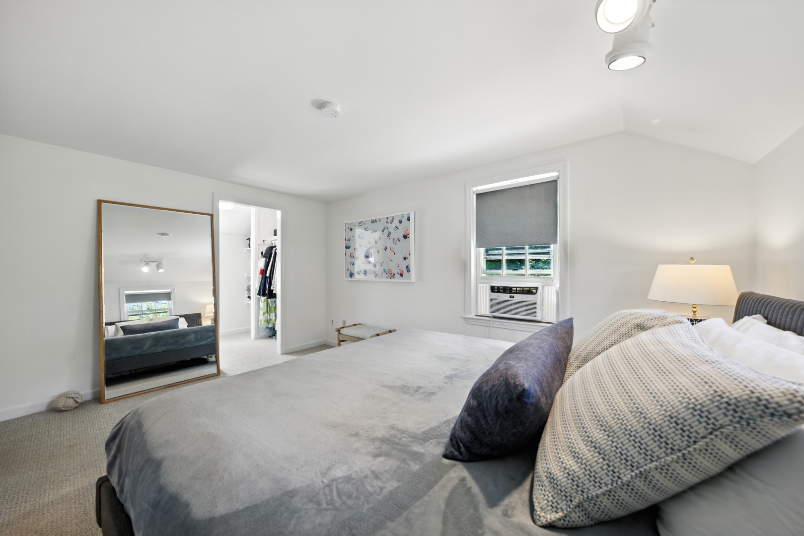 2 The Grove Nantucket, MA 02554 - Photo 18 of 33 a bedroom with a bed and a mirror