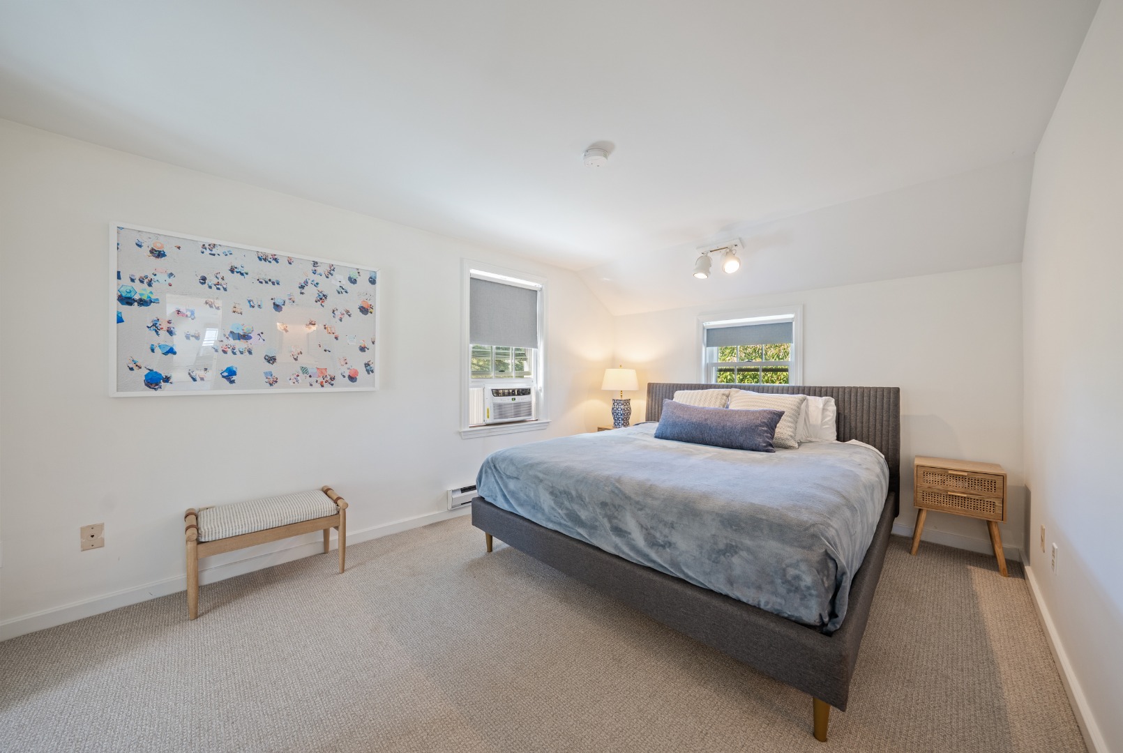 2 The Grove Nantucket, MA 02554 - Photo 19 of 33 a bedroom with a bed and a couch