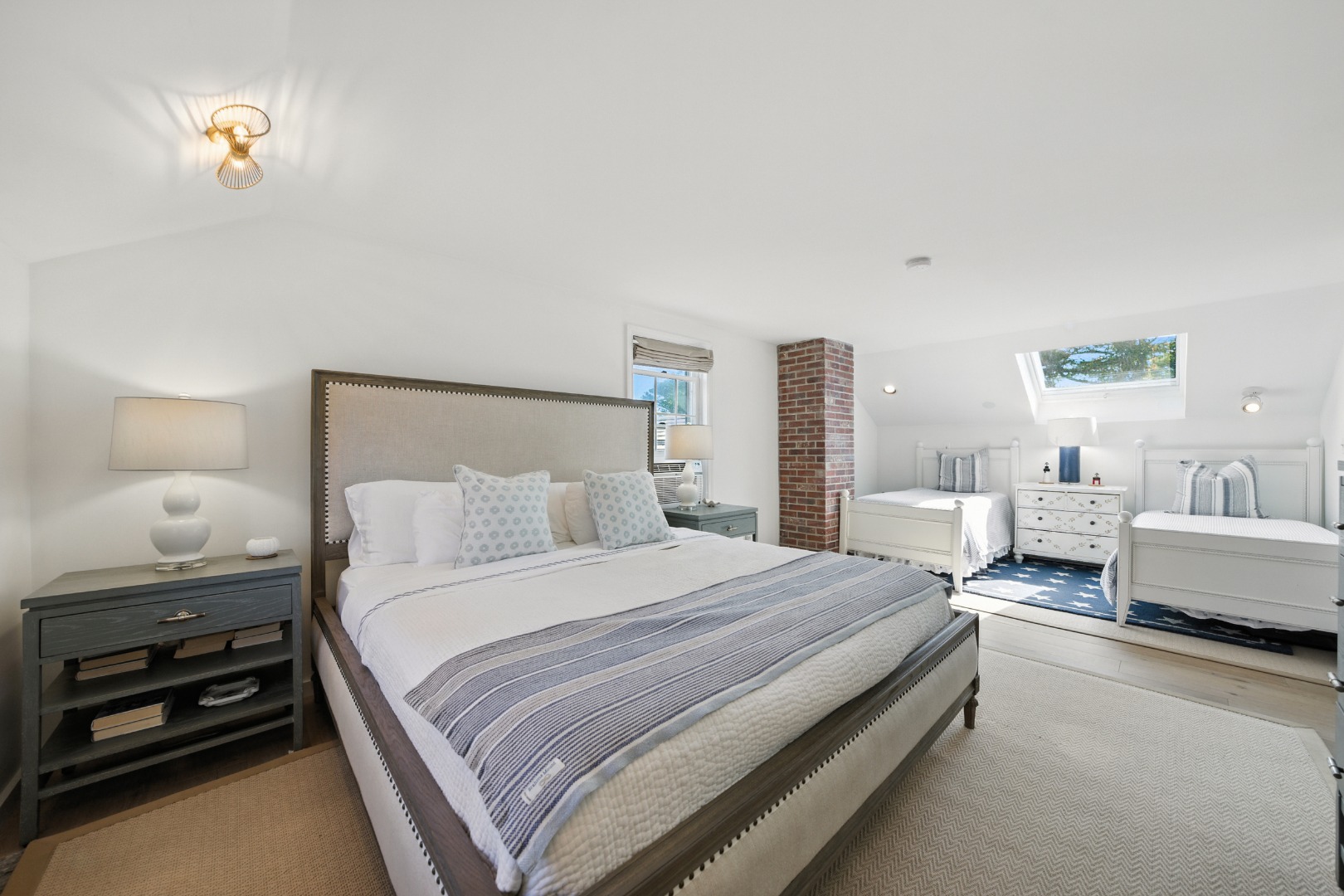 2 The Grove Nantucket, MA 02554 - Photo 20 of 33 a bedroom with a bed and a couch