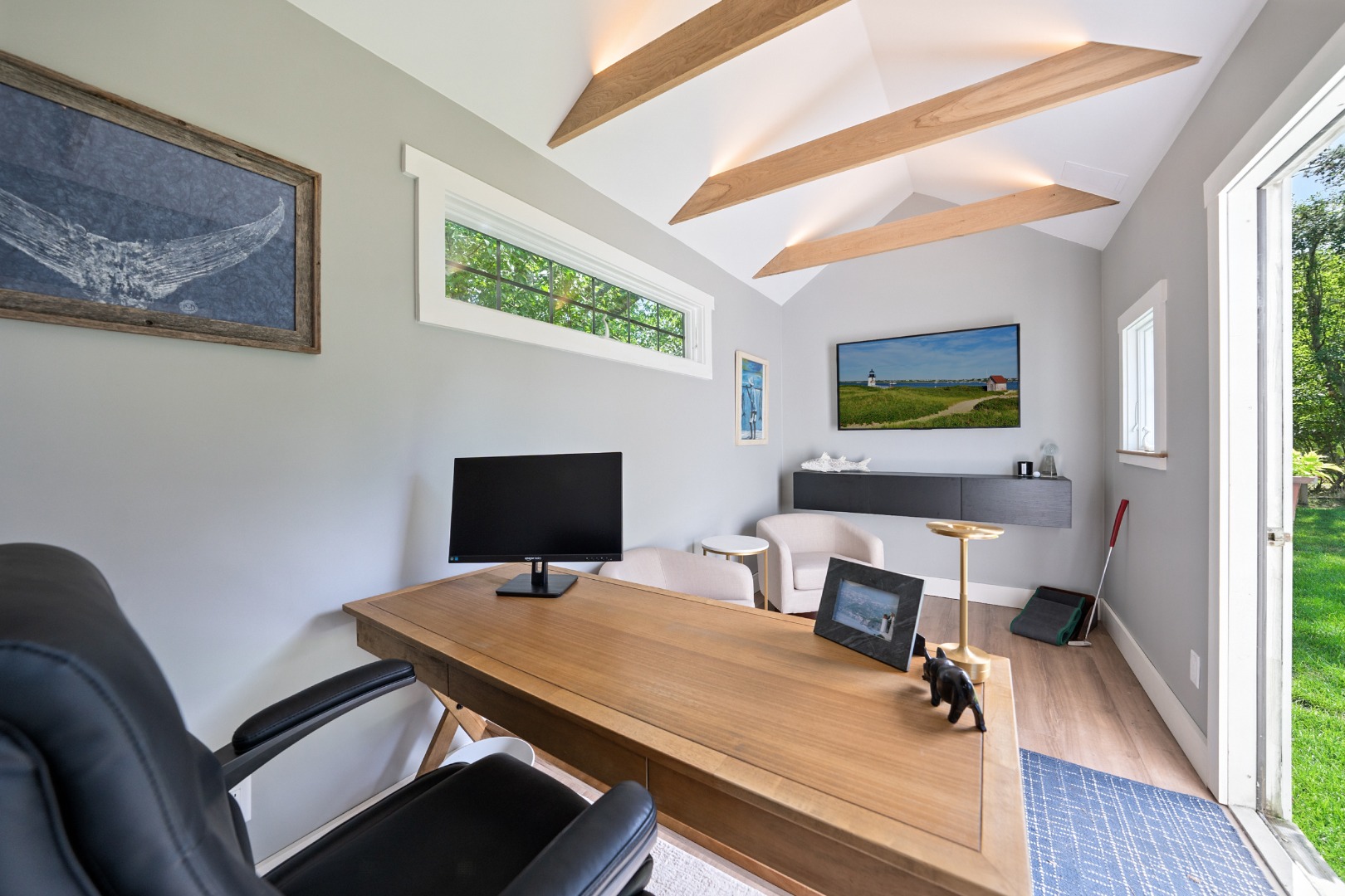 2 The Grove Nantucket, MA 02554 - Photo 24 of 33 a room with furniture wall paintings a piano and a window