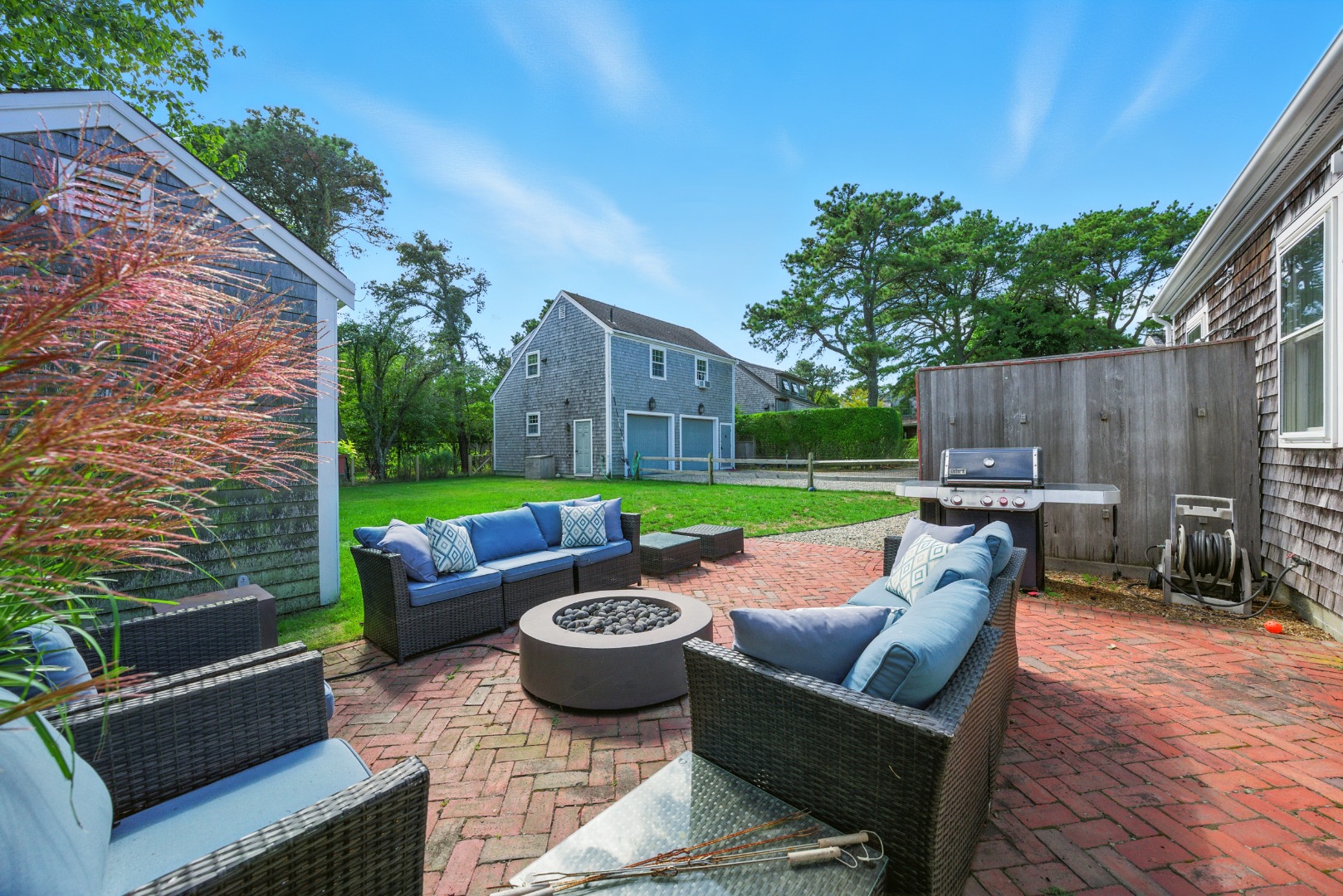 2 The Grove Nantucket, MA 02554 - Photo 28 of 33 a view of outdoor sitting area with furniture and wooden fence