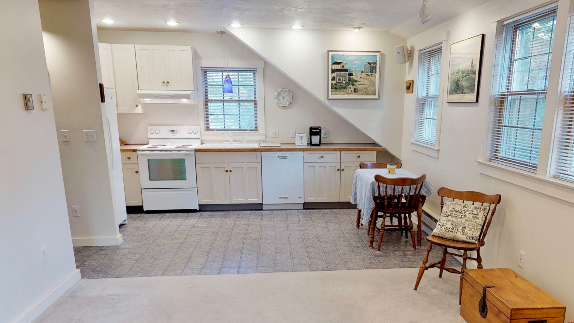 2 The Grove Nantucket, MA 02554 - Photo 30 of 33 a room with stainless steel appliances kitchen island granite countertop furniture and a kitchen view