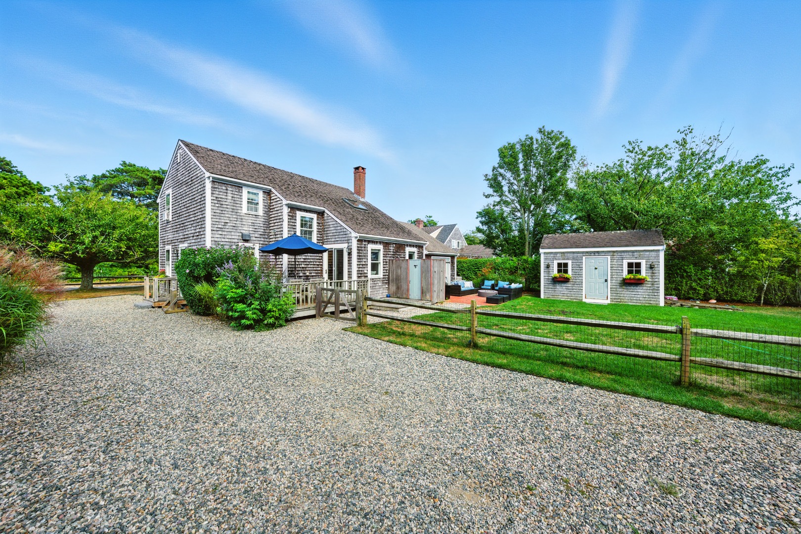 2 The Grove Nantucket, MA 02554 - Photo 3 of 33 a front view of house with yard and green space