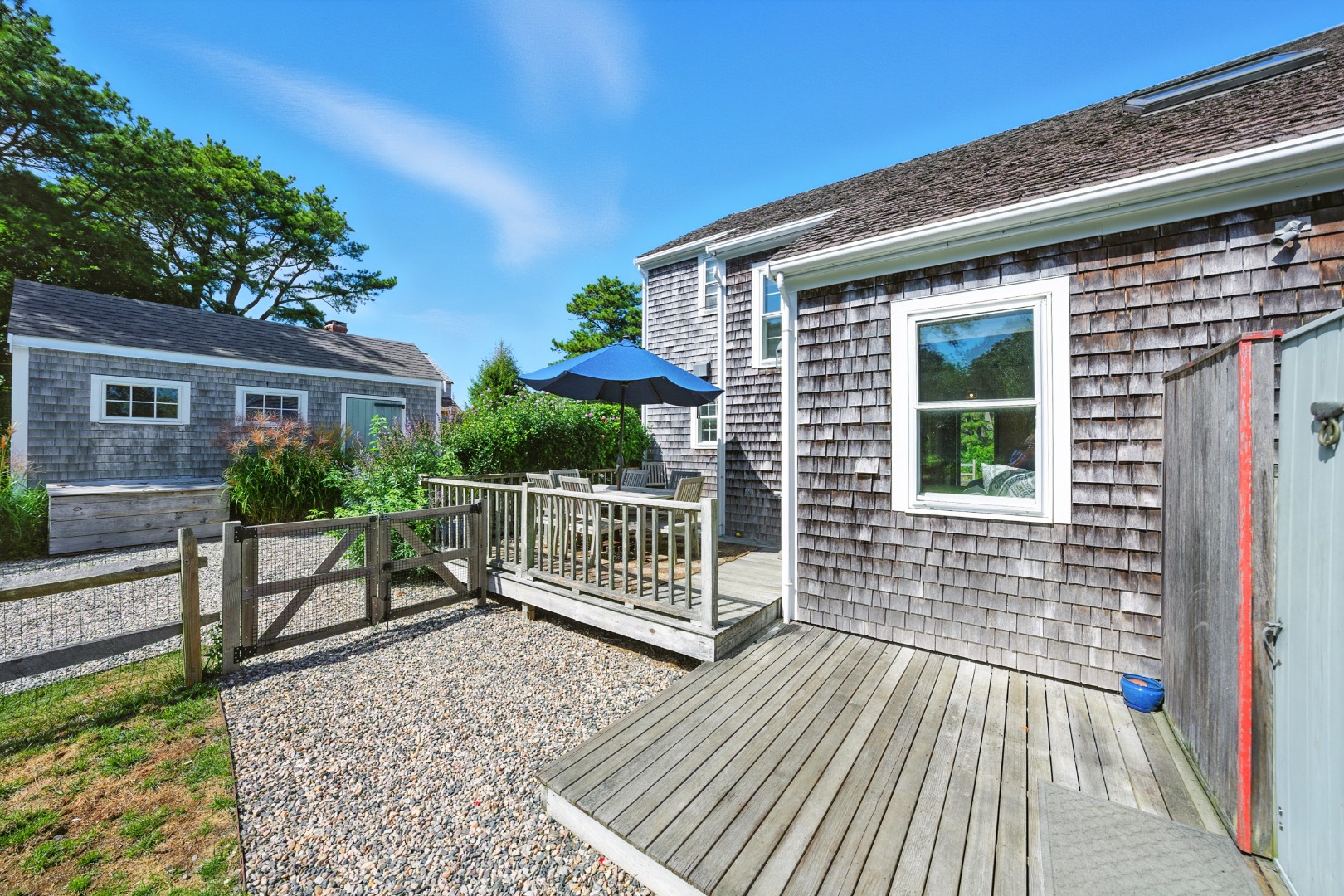 2 The Grove Nantucket, MA 02554 - Photo 4 of 33 a view of backyard with a patio and deck