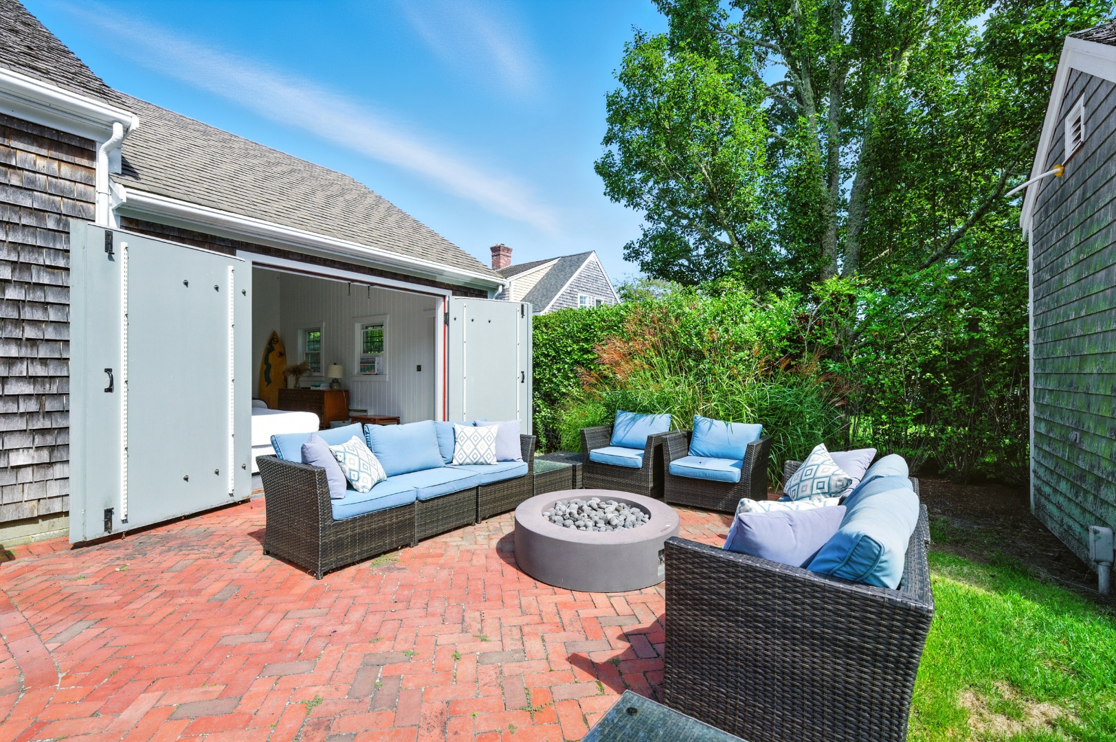 2 The Grove Nantucket, MA 02554 - Photo 6 of 33 a outdoor living space with furniture and garden view