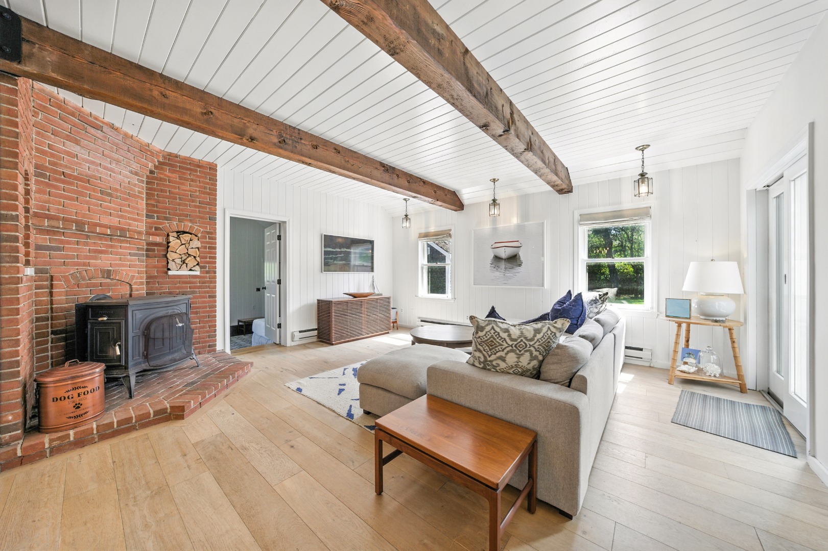 2 The Grove Nantucket, MA 02554 - Photo 10 of 33 a living room with furniture wooden floor and a fireplace
