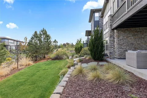 a view of a backyard with plants