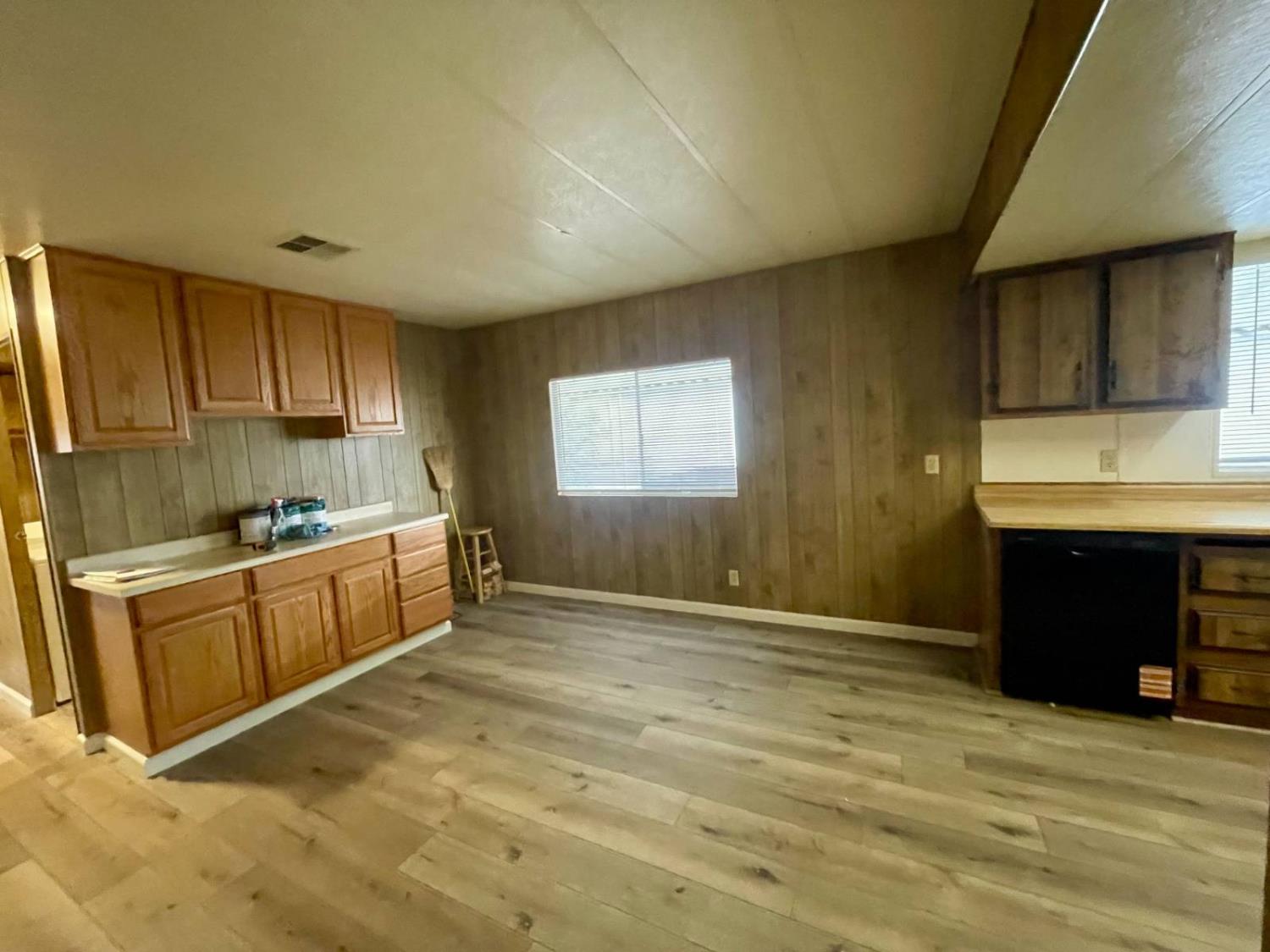 3901 Lake Road, Unit 111 West Sacramento, CA 95691 - Photo 12 of 16 a kitchen with stainless steel appliances granite countertop a stove a sink and a refrigerator