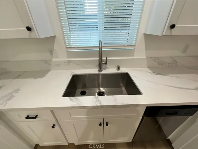 a close view of sink and mirror