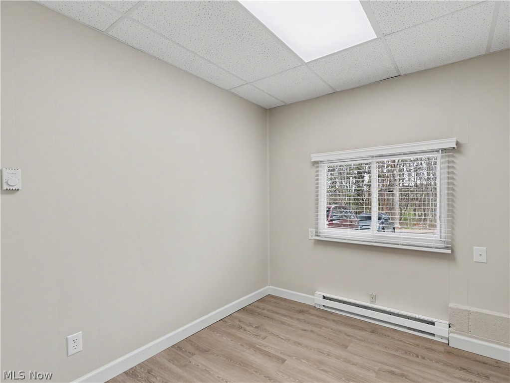 8406 Whipporwill Road Ravenna, OH 44266 - Photo 15 of 26 Bonus flex room use as office or 4th bedroom, window to front of home, luxury vinyl plank flooring, electric baseboard heat and closet.