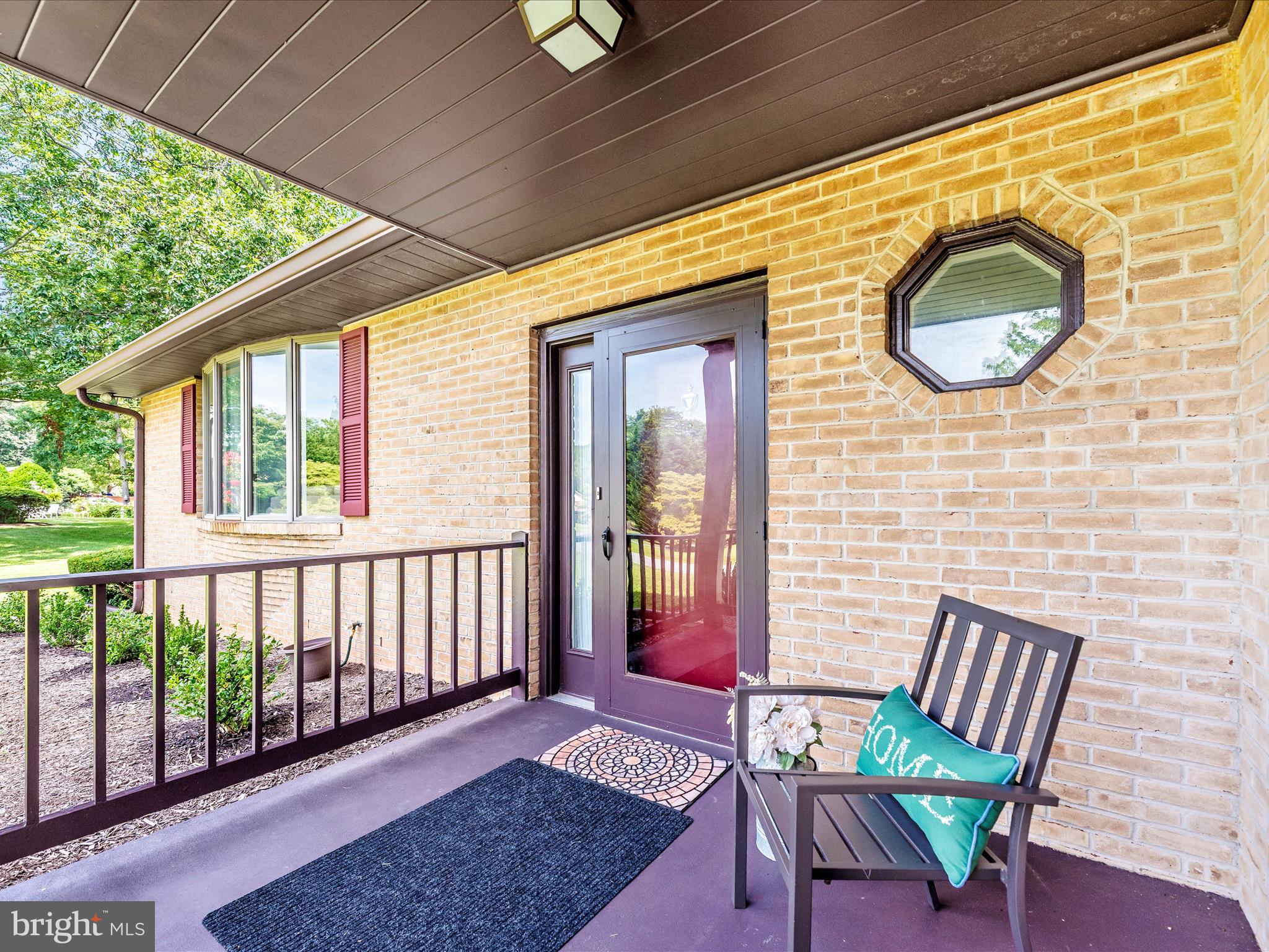 5018 Camelback Lane Frederick, MD 21703 - Photo 2 of 41 a view of a chair and table in the balcony