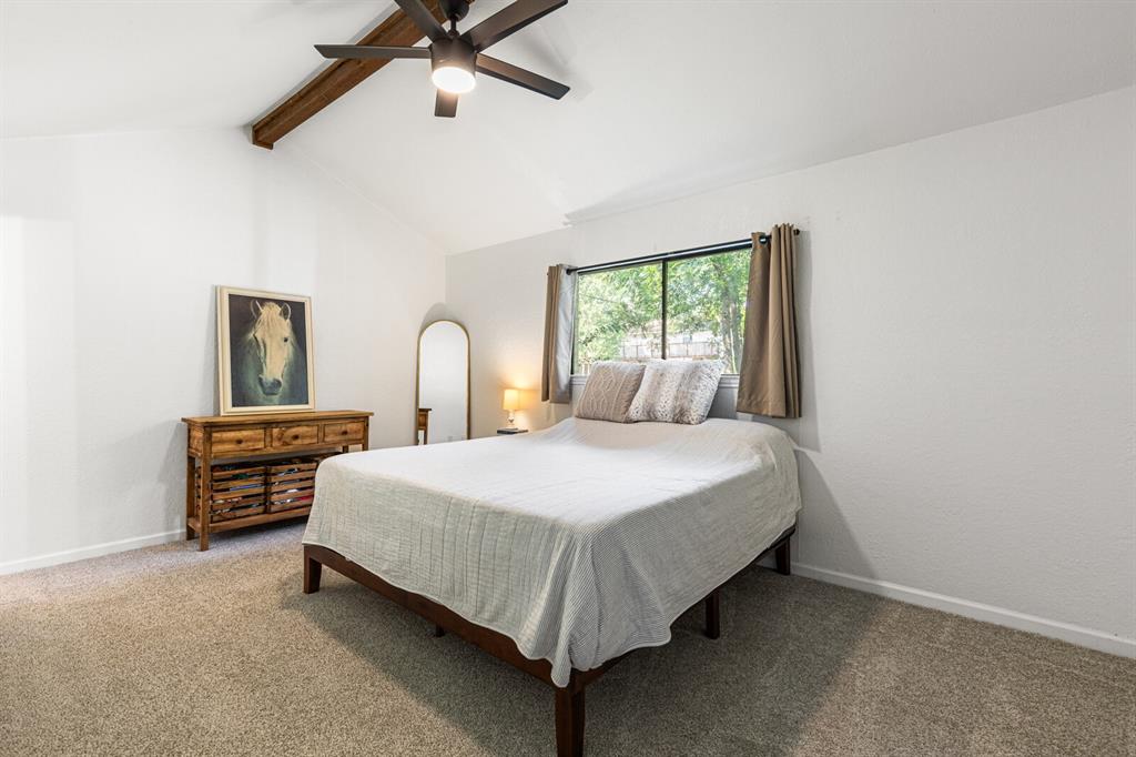 116 Marylee Drive Hewitt, TX 76643 - Photo 11 of 21 a bedroom with a bed lamp and a window