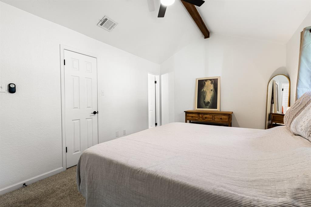 116 Marylee Drive Hewitt, TX 76643 - Photo 12 of 21 a bedroom with a bed and a large mirror