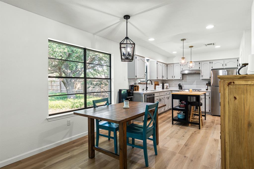 116 Marylee Drive Hewitt, TX 76643 - Photo 8 of 21 a view of a dining room with furniture window and wooden floor