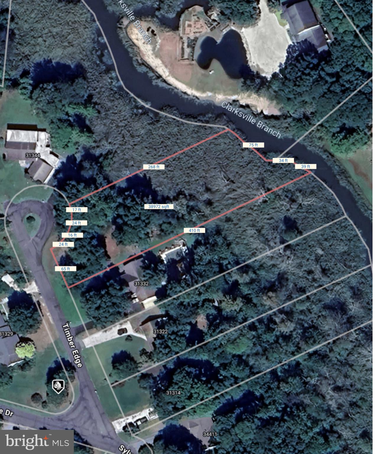 a vase of flowers sitting on a floor