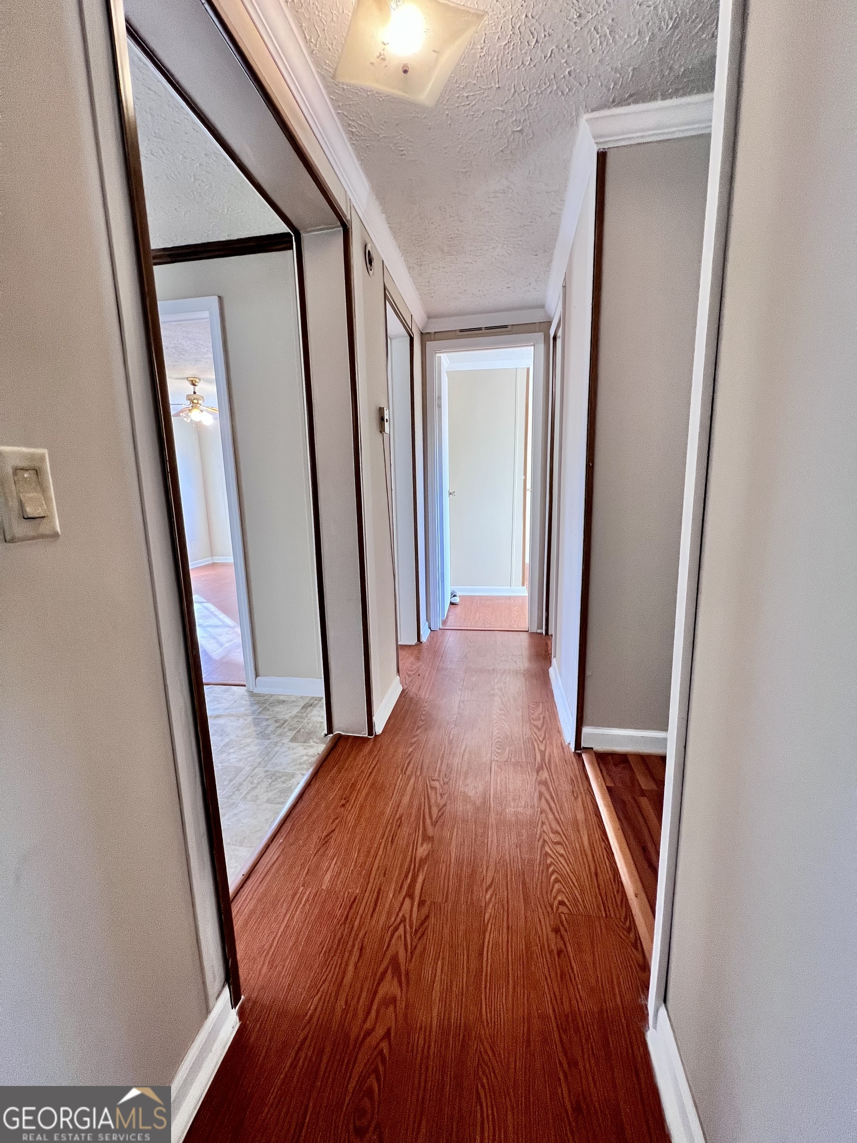 103 Henderson Springs Road Elko, GA 31025 - Photo 17 of 33 a view of a hallway with wooden floor