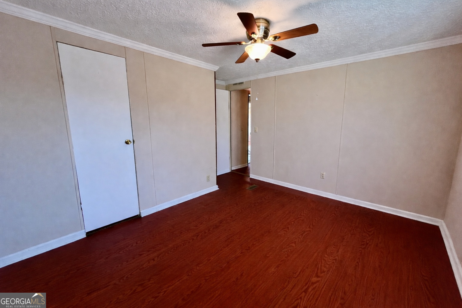 103 Henderson Springs Road Elko, GA 31025 - Photo 20 of 33 an empty room with wooden floor and windows