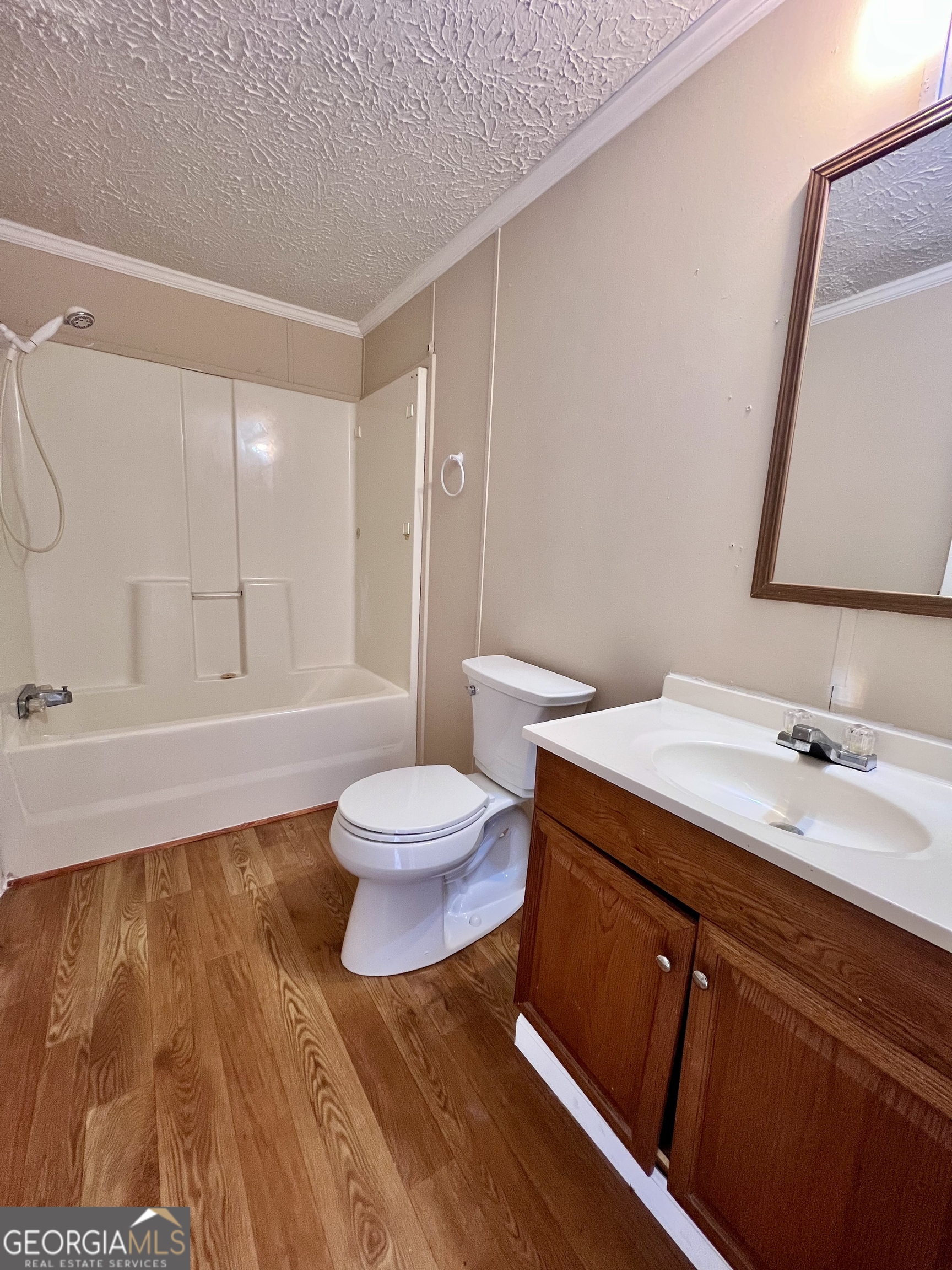 103 Henderson Springs Road Elko, GA 31025 - Photo 21 of 33 a spacious bathroom with a sink and a mirror