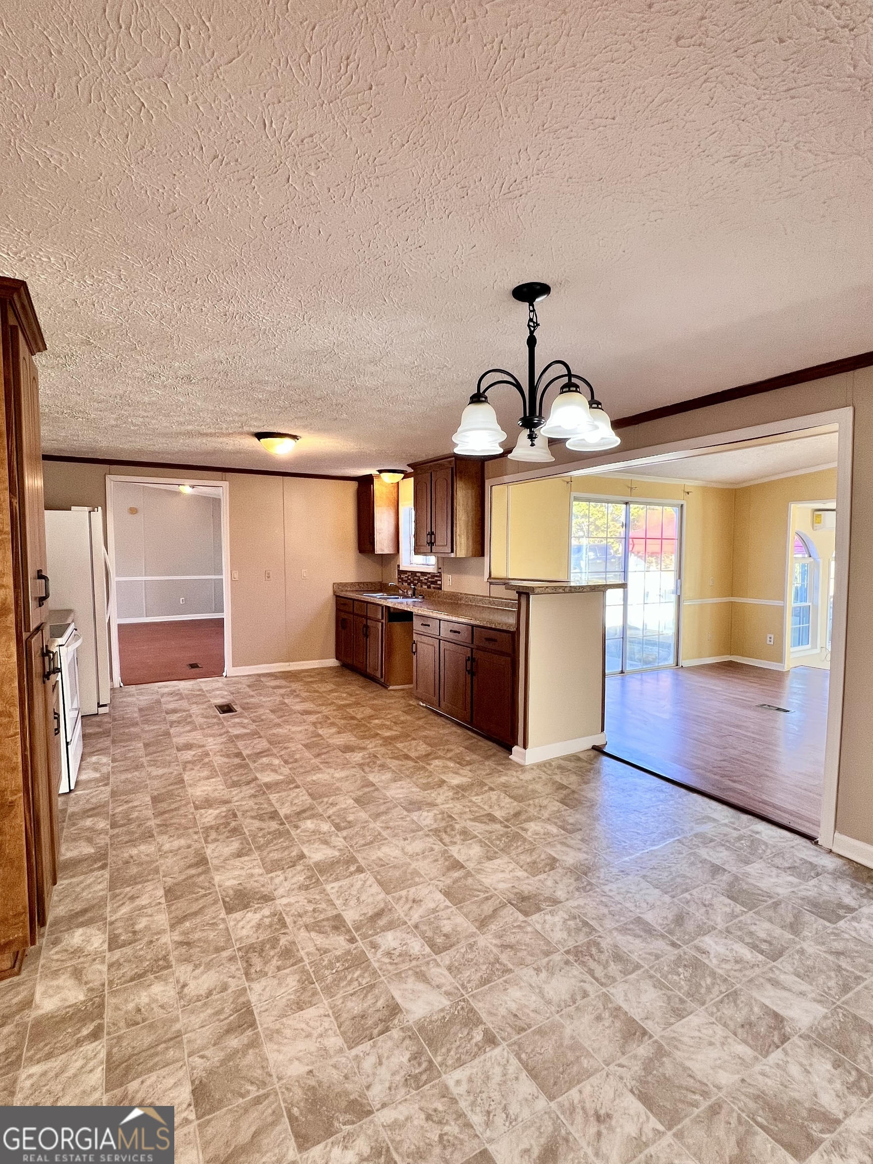 103 Henderson Springs Road Elko, GA 31025 - Photo 7 of 33 a view of a kitchen with a sink and cabinets