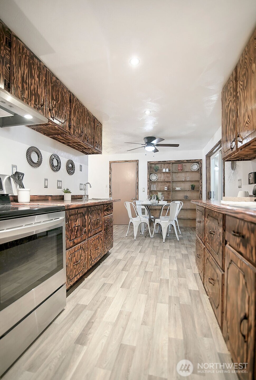140 Rodgers Road Silverlake, WA 98645 - Photo 13 of 35 a living room with furniture and a fireplace